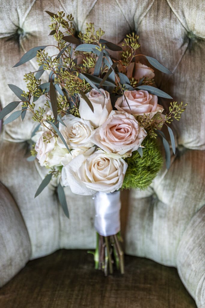bridal bouquet sitting in chair