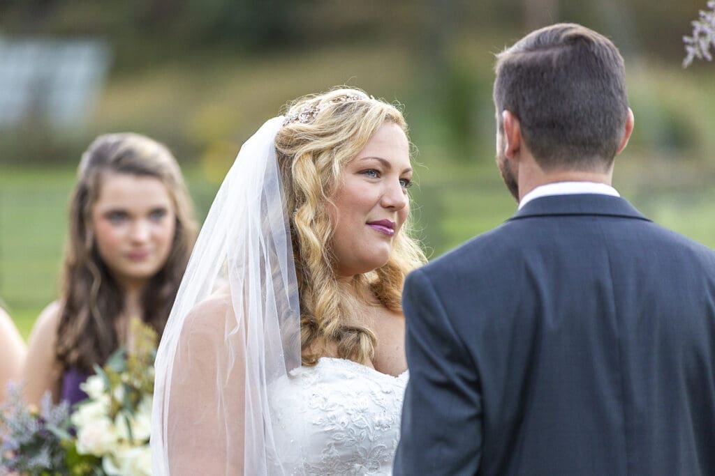 close up of bride during ceremony at fields of blackberry cove
