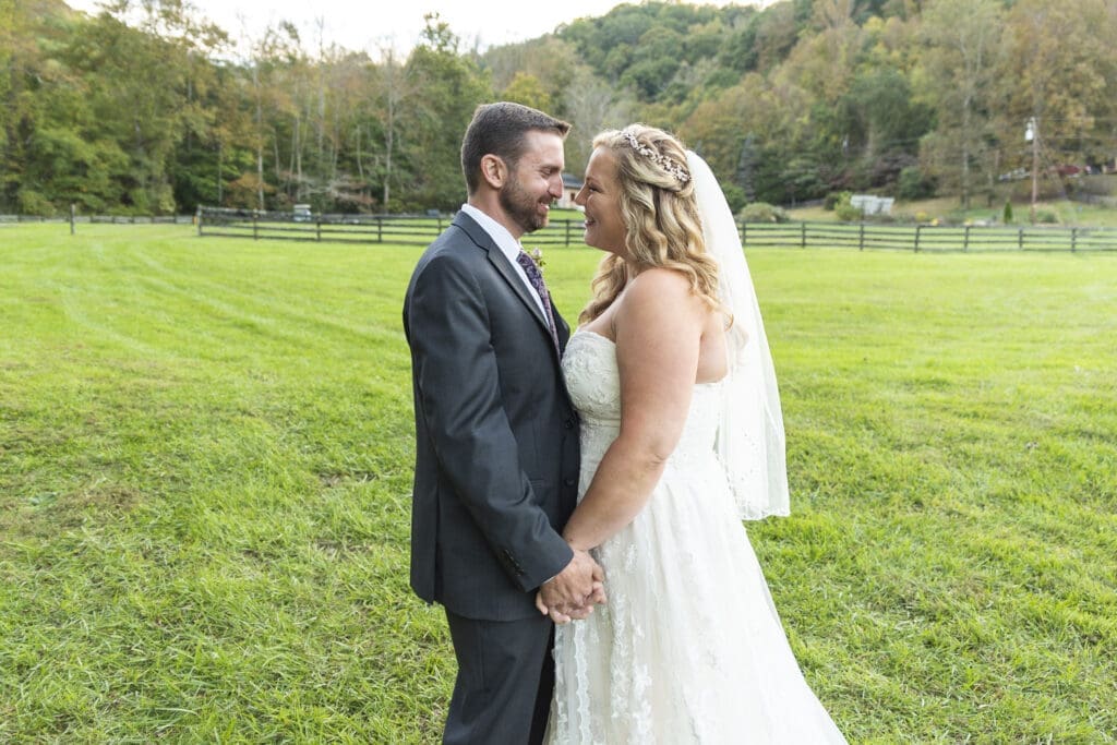 Bride and groom embracing after ceremony
