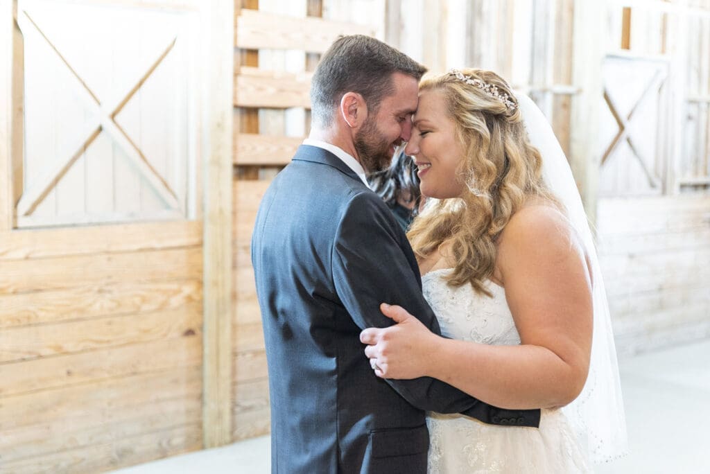 bride and groom embracing during first dance