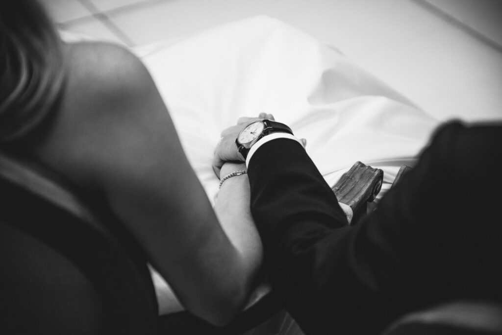 bride and groom holding hands