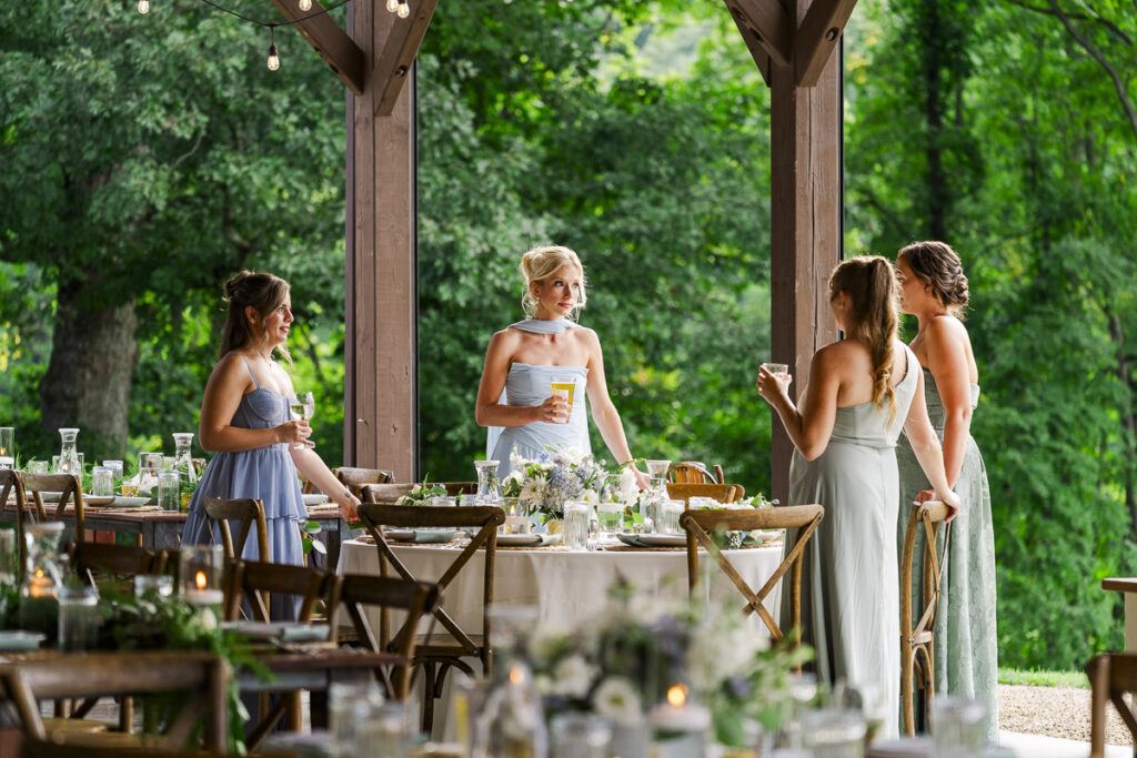 guests talking during reception at The Farm A Gathering Place Wedding Venue