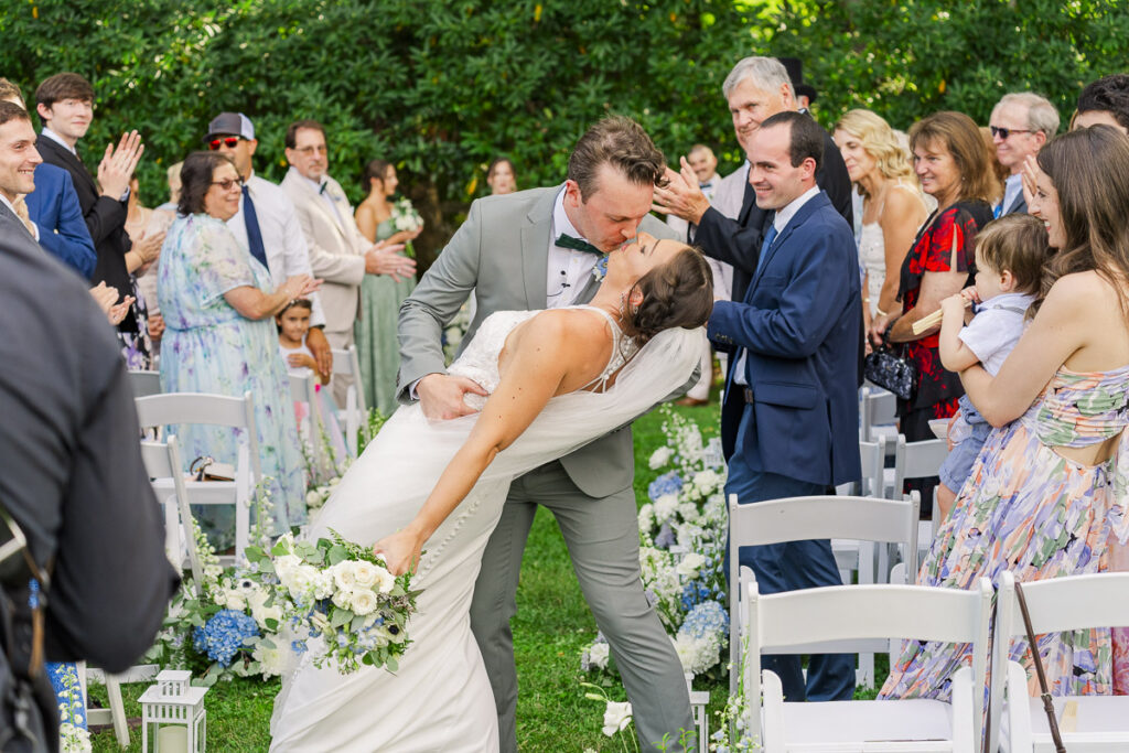 dip kiss at the end of recessional aisle