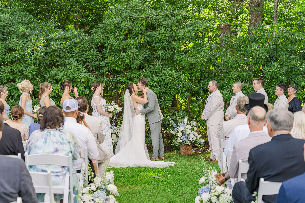 first kiss during The Farm A Gathering Place Wedding
