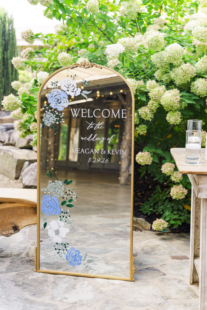 mirror signage welcoming guests to wedding at The Farm A Gathering Place